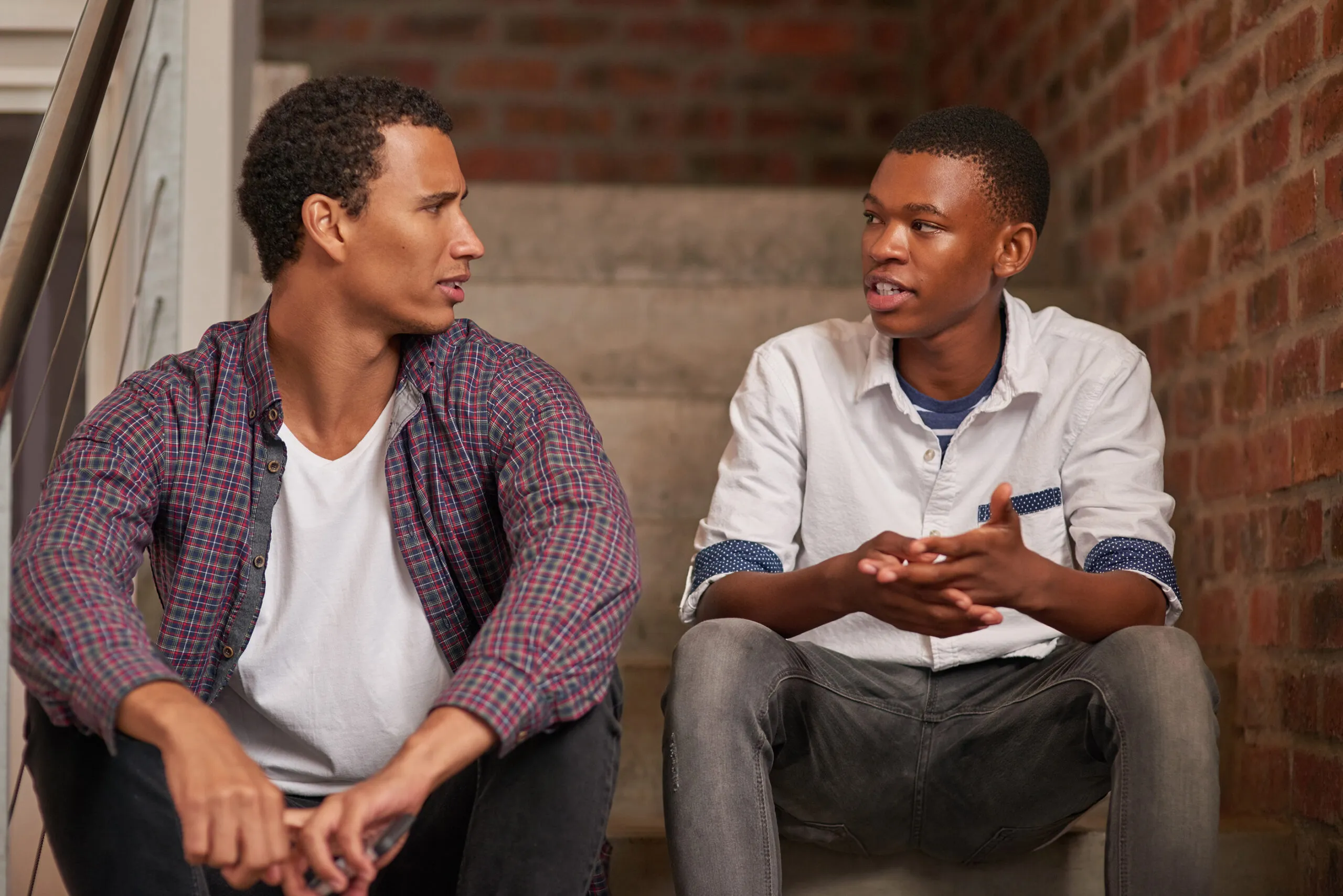2 men talking